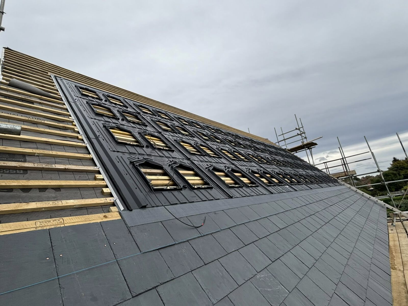 All-black in-roof solar panels on a home at Braunston, Daventry