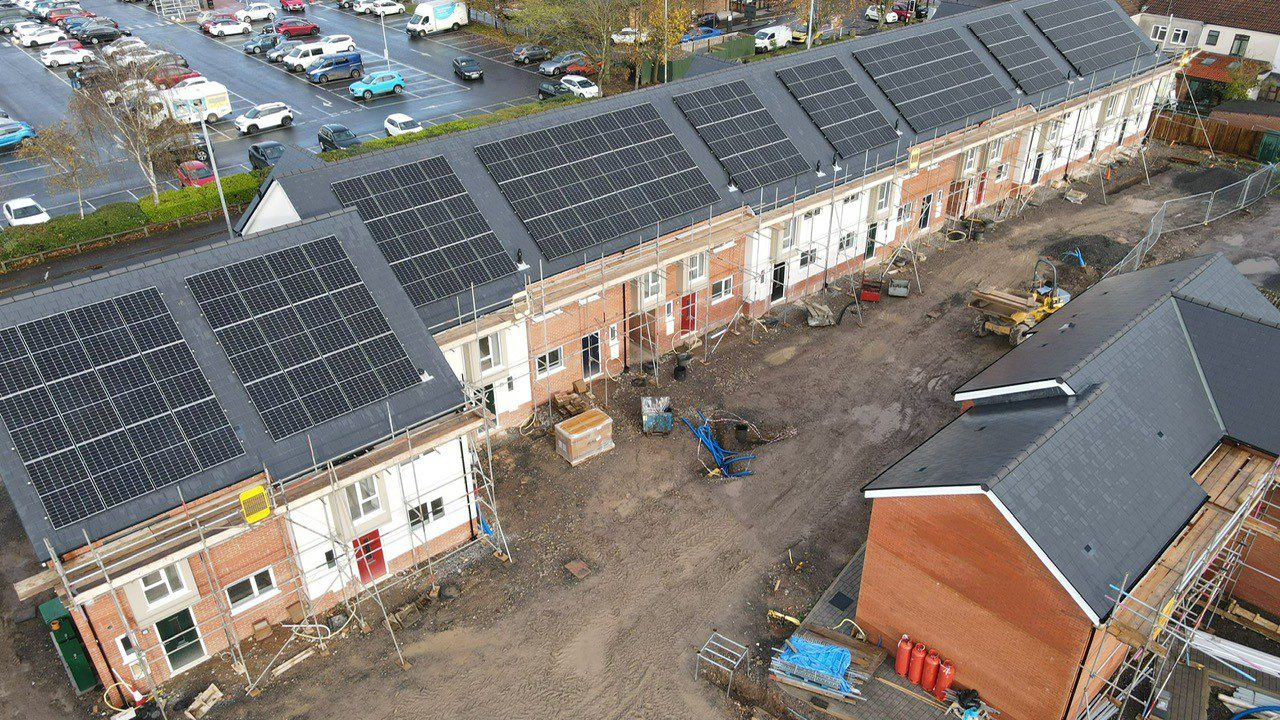 Solar panels on a row of new-build homes